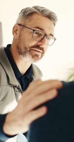 Consulting, healthcare and physiotherapist man in office with hand on shoulder of patient. Accident, comfort and medical advice of chiropractor talking to client in clinic for healing or therapy