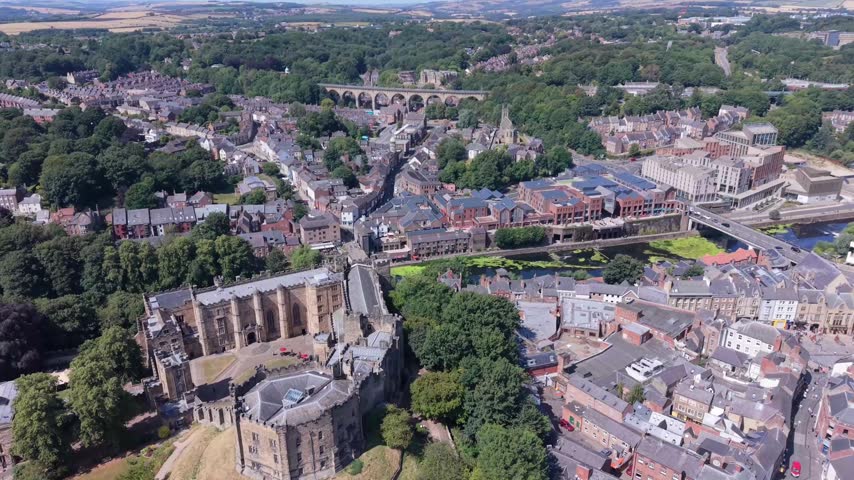 DURHAM, UK - AUGUST 2026: Scenic aerial shot of historic Durham Cathedral, River Wear and cityscape in County Durham (Color Graded)