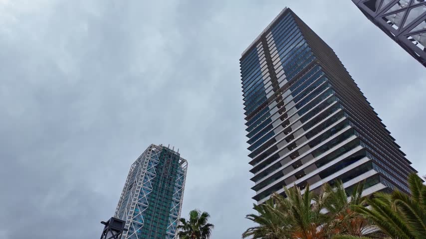 Low angle view of modern Hotel Arts and Torre Mapfre skyscrapers in Barcelona, Spain