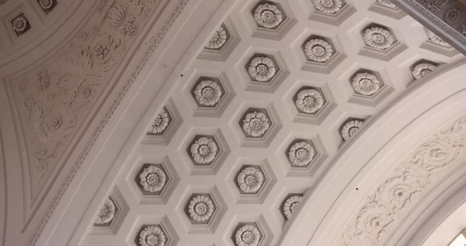 Ornate coffered ceiling with floral motifs inside Imperia Basilica, Italian Riviera