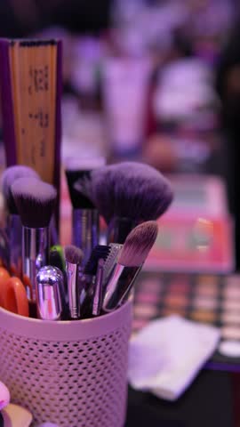 Professional Makeup Brushes Organized in Holder at Beauty Salon