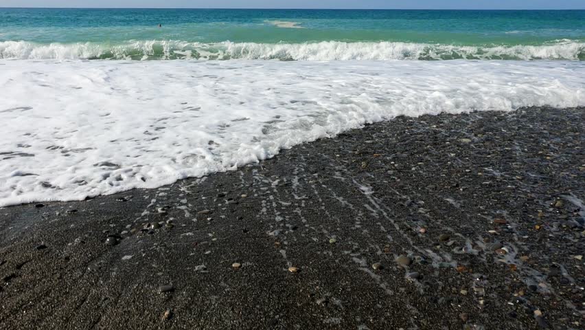 Ocean wave breaking on the shore of the Black Sea coast Russia