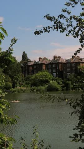Houses Alongside the Lake at Hampstead Heath on a Sunny Day