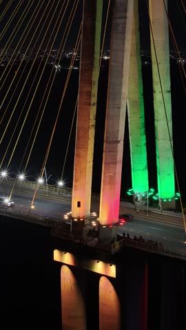 Night Cable Bridge At Manaus In Amazonas Brazil. Illuminated Bridge. Downtown City. Bright Traffic Lights. Cable Bridge In Manaus In Amazonas Brazil. Beautiful Skyline. Illuminated Bridge.