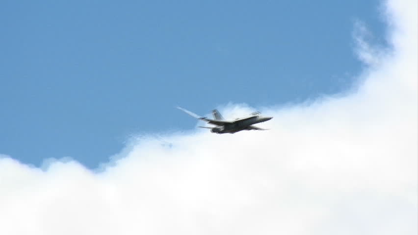 US Navy jet performing aerobatics.