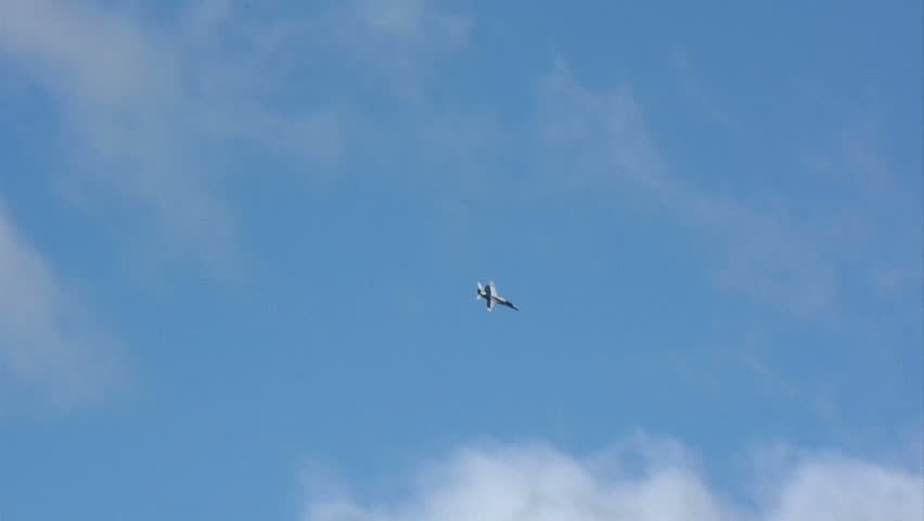 US Navy fighter plane performing aerobatics. Clip continues from where 