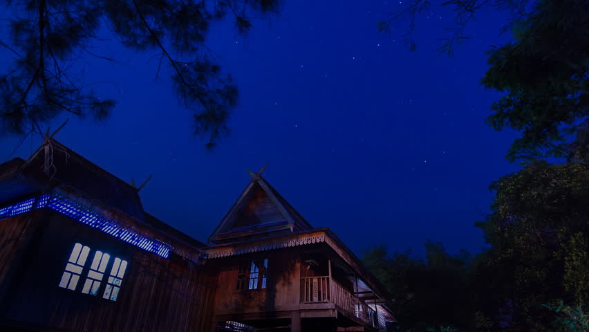 beautiful time lapse star trail and thailand ancient house