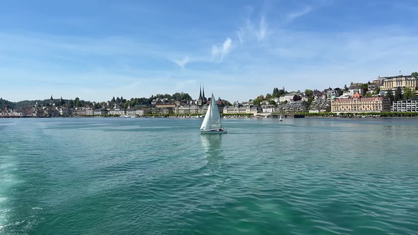 A location-focused view of Lucerne, Switzerland, showcasing the town as a distinctive European travel destination. The urban setting provides versatile footage for tourism campaigns, travel documentaries, vacation programs, destination guides, cultural storytelling, city presentations, and promotional media centered on Swiss travel and European tourism.