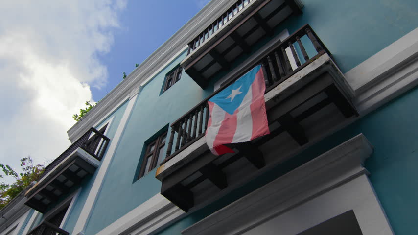 Puerto Rican Flag Flapping in the Wind from Historic Colonial Balcony in Old San Juan, Puerto Rico – Locked Off (UHD 4K)