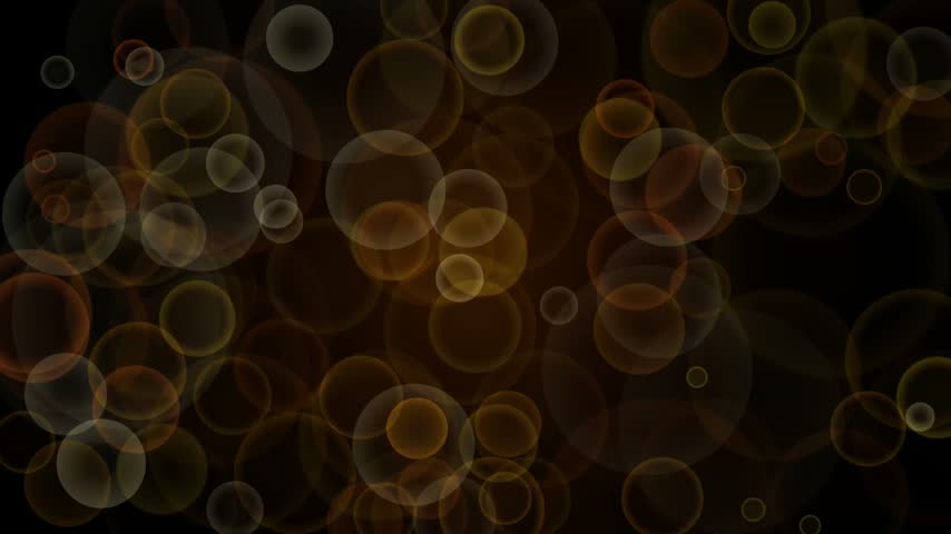 A sophisticated motion graphics background featuring soft, glowing amber and gold circular bokeh particles floating slowly against a deep black void. This elegant, looping particle animation is perfect for luxury event overlays and presentations.