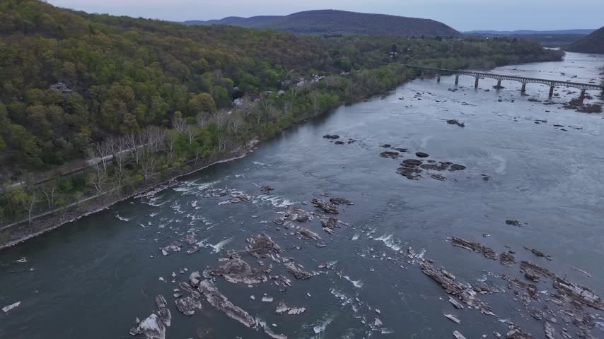 Aerial view of rocky Potomac River and bridge near Harpers Ferry West Virginia