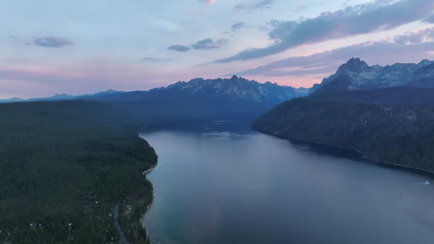 Aerial view of Redfish Lake and Sawtooth Mountains at sunset in Stanley, Idaho, United States.