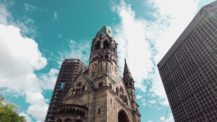 Kaiser Wilhelm Memorial Church. neo Romanesque church in Berlin, Germany. world war 2 artifact. dolly zoom in
