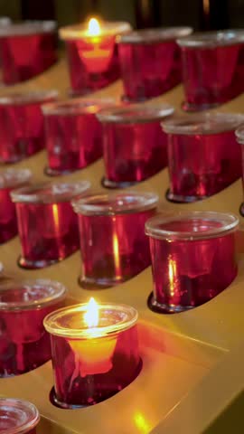 Turin Cathedral Duomo di Torino , burning candles in red candlesticks, at the altar in the catholic church, Chapel of the Holy Shroud