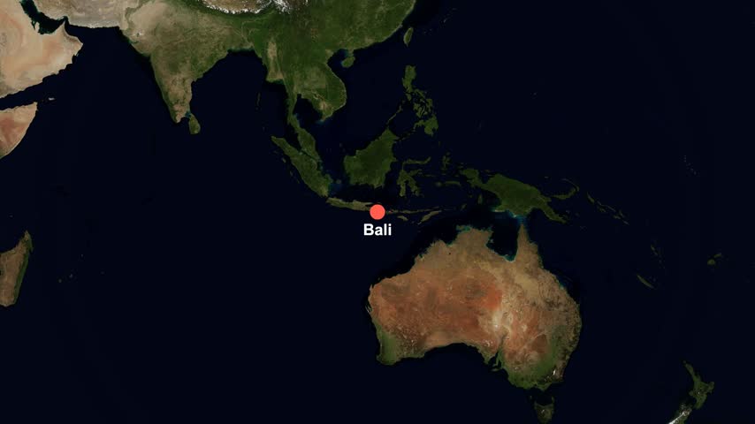 Landscape animated satellite map flyover tracing a travel route from Bali, Indonesia to Santorini, Greece.