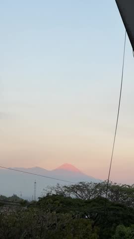 Afternoon view of a mountain bathed in sunlight