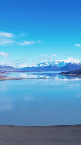Patagonia Lake In El Calafate Santa Cruz Argentina. Natural Freshwater Lagoon Nestled Between White Sand Dunes. Countryside Alps. Snow Covered Mountain. El Calafate Santa Cruz.
