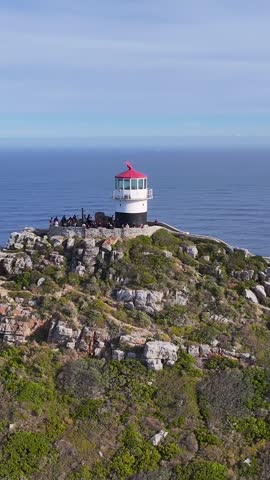Famous Cape Point In Cape Town South Africa. Birds Eye View Of Lighthouse Standing Tall Against The Blue Sky. Bay Water Landscape. Landmark Coast. Cape Town South Africa.
