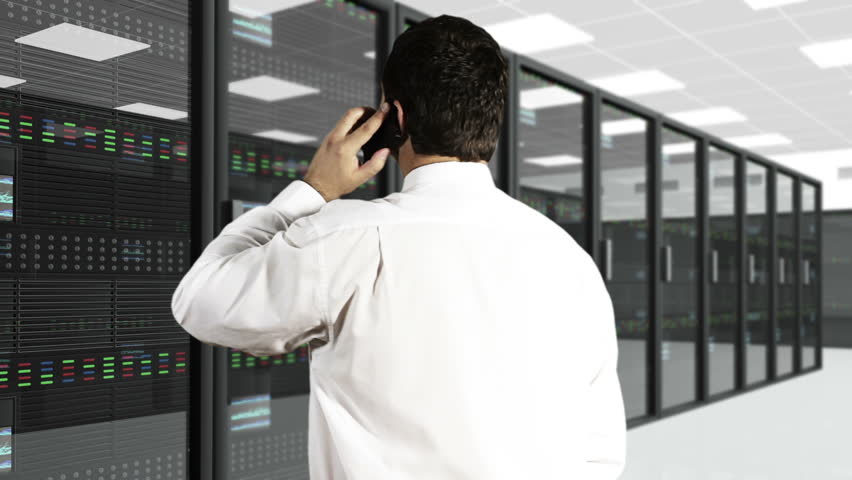 Young Man Talking Phone CPU Server Unit Room