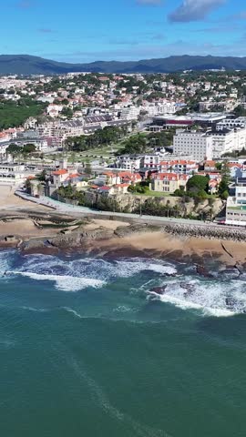 Tamariz Beach In Cascais District Of Lisbon Portugal. Aerial View Of A High-Rise Buildings And Traffic Showcasing Urban Life. Summer Backgrounds. Seaside Beach. Cascais District of Lisbon.