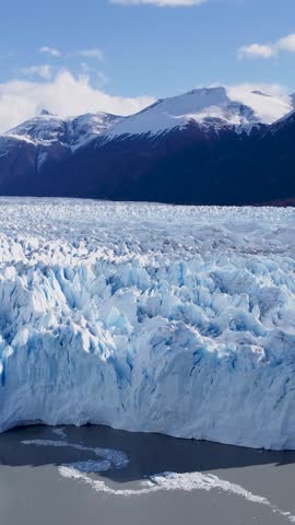 Los Glaciares National Park In El Calafate Santa Cruz Argentina. Glacier Calving Into Icy Lagoon With Snow Capped Mountains. Countryside Alps. Forest Trees Landscape. El Calafate Santa Cruz.