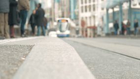 Tramway and bus station focused on pedestrians feet. Find similar clips in our portfolio.