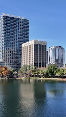 Orlando Skyline In Orlando Florida United States. Aerial View Of Green Space Surrounded By Lush Forest Trees. District Skyline. Cities Of The World Landscape. Orlando Florida.