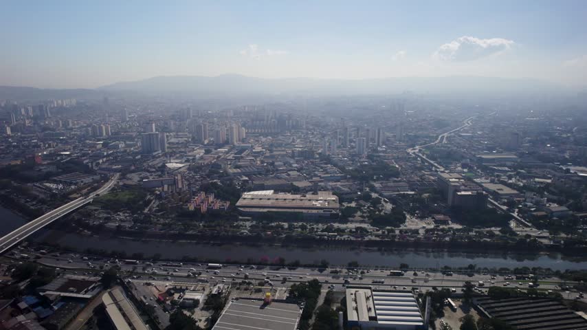 Drone flying really high with the Tietê rroad and Tietê river inthe frame. São Paulo Brazil