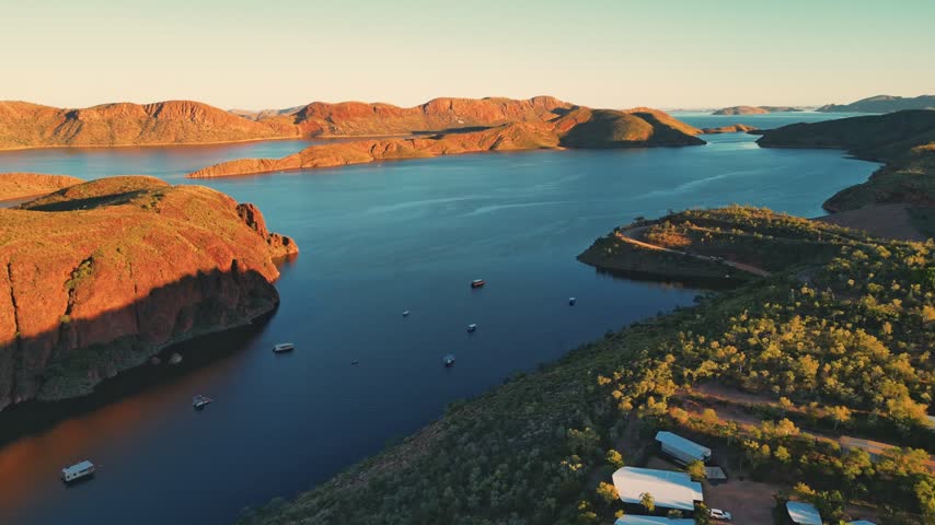 Cinematic drone shot of lake argyle in Australias outback during sunset.
