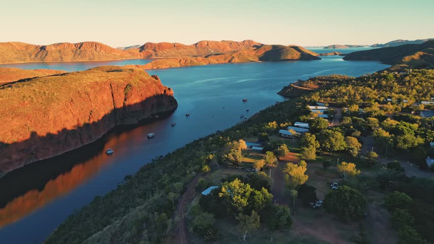 Beautiful cinematic aerial footage of lake argyle in Australias outback during sunset.
