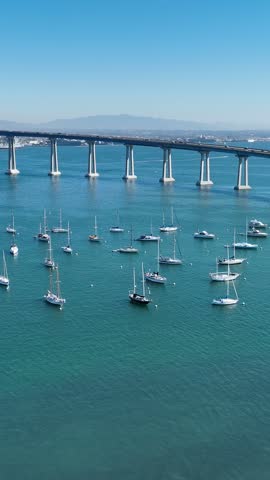 Conorado Bay Bridge In San Diego California United States. Birds Eye View Of Suspension Bridge With Cars Driving Across. Downtown Cityscape. Urban Backgrounds. San Diego California.
