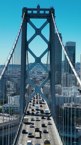 Oakland Bay Bridge In Oakland California United States. Traffic Is Moving Across A Modern Cable-Stayed Bridge. District Skyline. Urban Backgrounds. Oakland California.