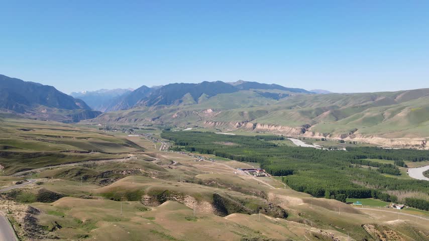 Aerial View of Kekesu River, Forest, and Grassland in Yili, Xinjiang, China
