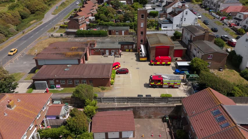 Drone Shot Firefighters, Engines and Training Tower at Fire Station in Brighton, England