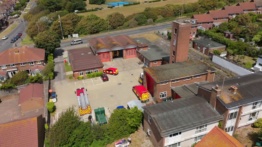 Aerial View Fire Station and Emergency Vehicles Near Brighton, England