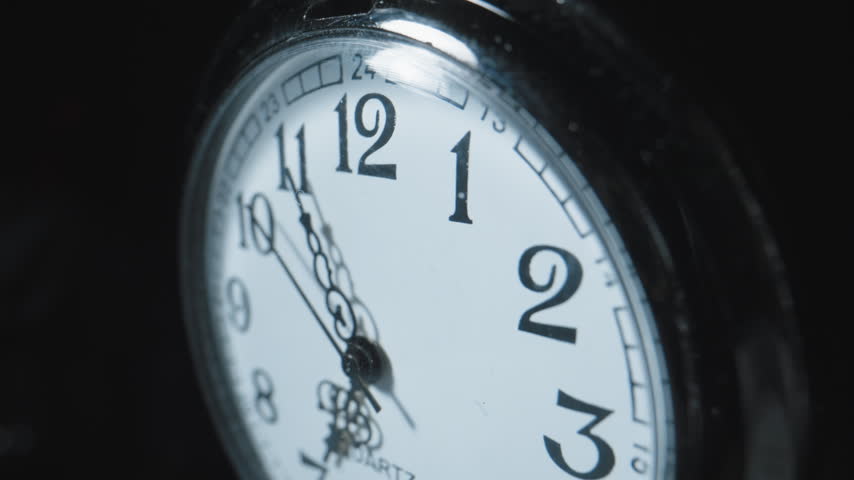 Fast motion timelapse of a second hand ticking around a stopwatch in a macro closeup.