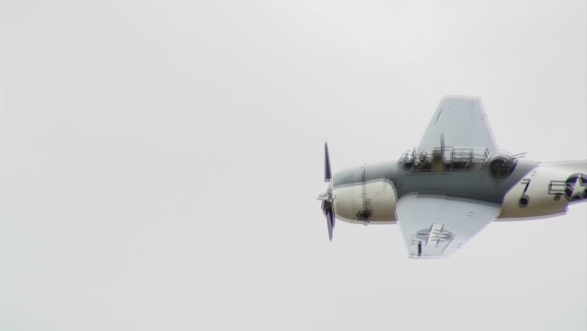 Grumman Avenger, WWII fighter plane in flight.