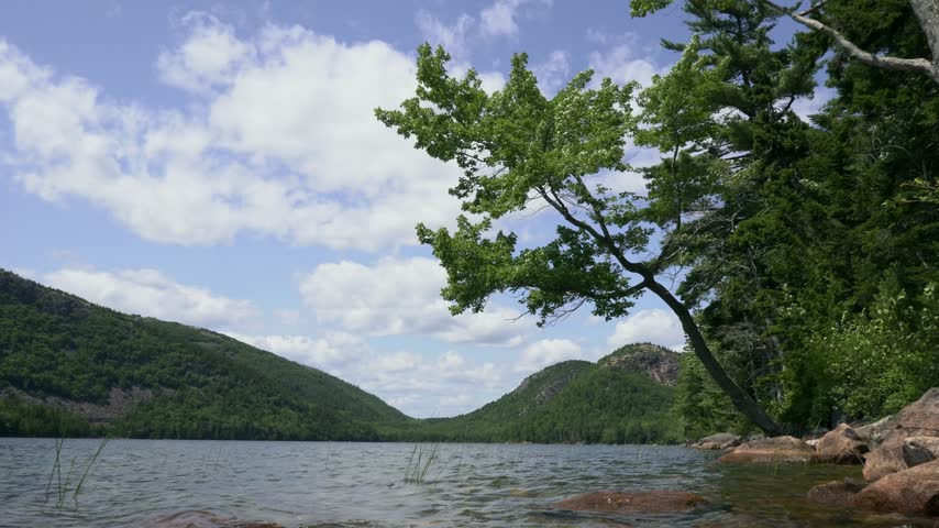 Jordan Pond In Acadia National Park, Maine, With The North and South Bubble Mountains Rising In The Distance. Wide Static Shot