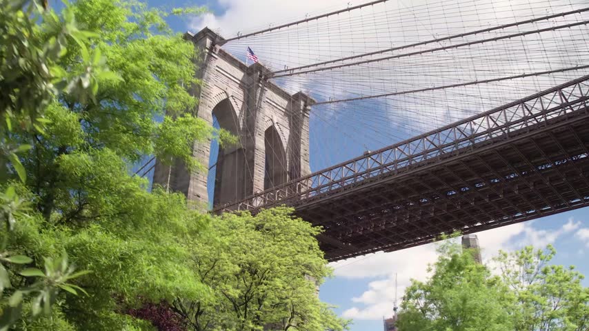 Low angle view of the iconic Brooklyn Bridge stone tower