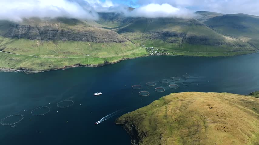 Aerial View of Salmon Farm and Speedboat in Faroe Islands