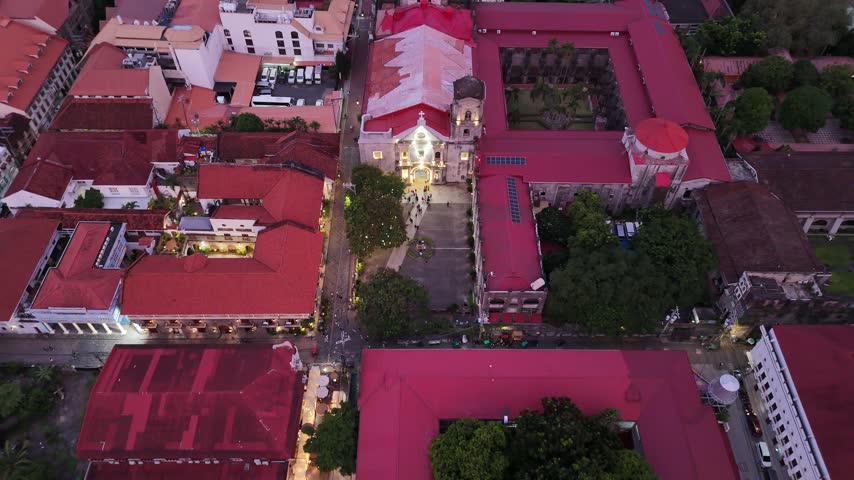 Intramuros historical UNESCO architecture, San Agustin Church in Manila, Philippines, Intramuros historical architecture and urban development in Manila, Philippines, an aerial drone view at dusk