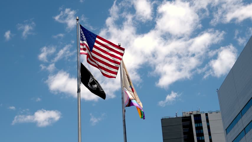 POW MIA flag, American flag, New Jersey state flag and rainbow flag in Trenton, New Jersey with stable video.