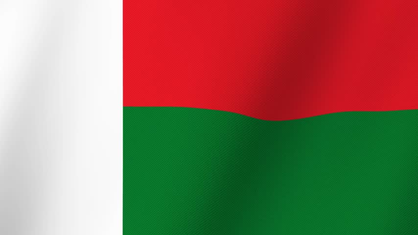 Close up of the waving flag of Madagascar with red and green stripes and a white vertical band