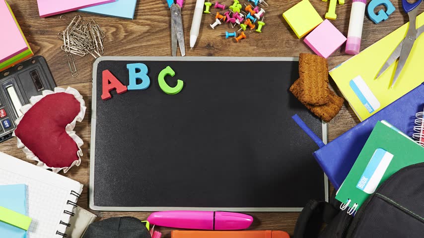 Back To School Flat Lay With Chalkboard, ABC Letters And Colorful School Supplies
