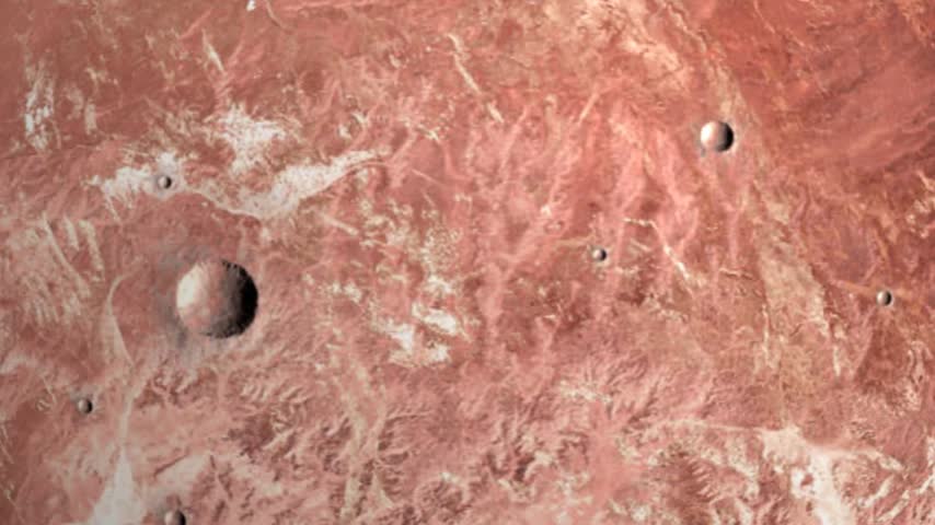 Zoom out Top down view of a desolate red planet surface featuring impact craters and rugged geological formations.