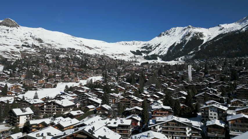 Wide angle aerial view of the town of Verbier in Switzerland on a clear sunny day