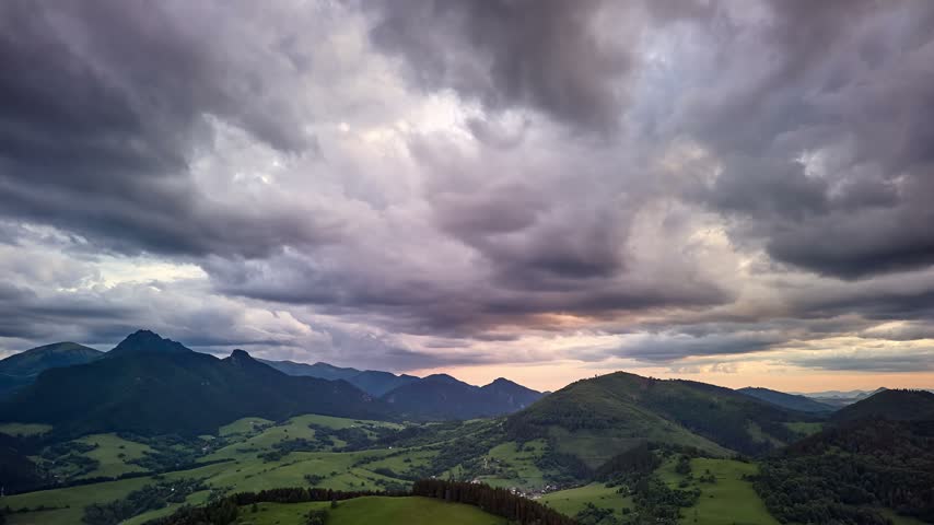 Aerial View of Heavy Dramatic Clouds Over Hilly Carpathian Landscape