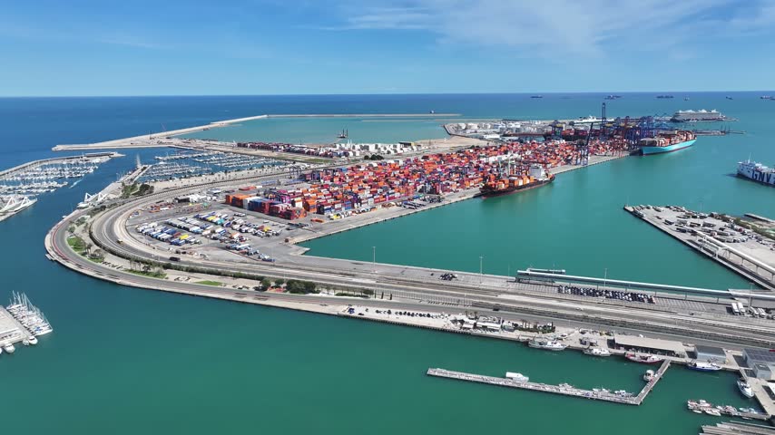 Port Of Valencia At Valencia In Valencian Community Spain. Freight Ship Scene. Maritime Transportation. Port Of Valencia At Spain. Exchange Landscape. Trade Market Scenery.