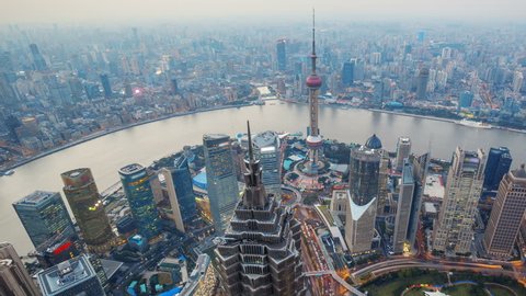 Shanghai From Day to Night, Time Lapse(Pan). 
Aerial view of high-rise buildings with Huangpu River in Shanghai, China. - >>> Please Search Newest Featured Clip: 1020262945.  วิดีโอสต็อก