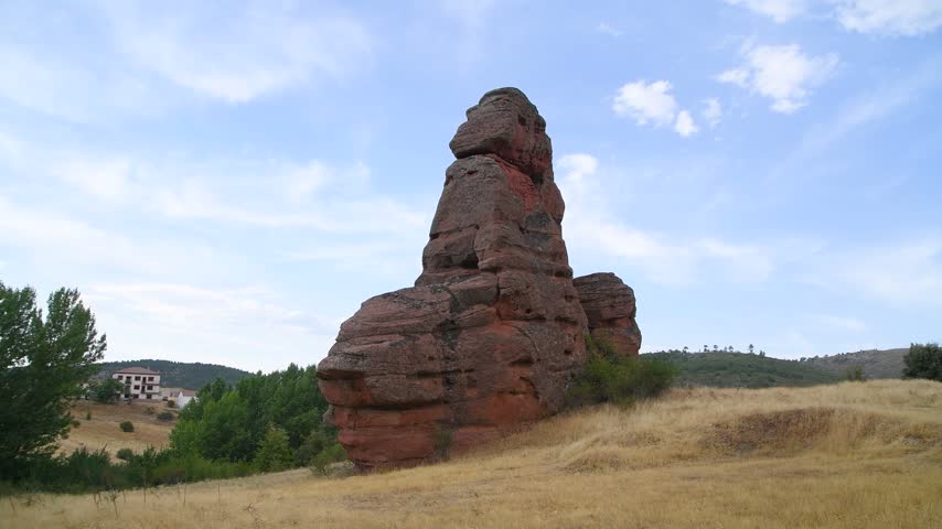 Stunning red rock formations in Chequilla landscape under blue sky